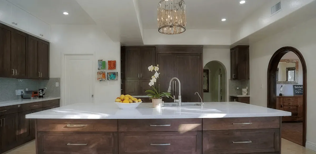 Cabinet refacing project with updated kitchen cabinets and island in Tucson, AZ